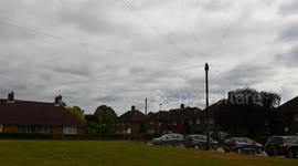 Aircraft skimming tops of council houses landing at London  heathrow