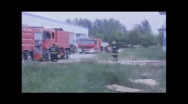 Firefighters struggle to deal with molten glass leak at factory in China