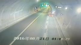 Car crashes after avoiding tarpaulin dropping from lorry