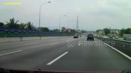 Lorry tyre bursts on motorway in Malaysia