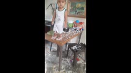 Toddler caught making rice mess on table in Bulacan, Philippines