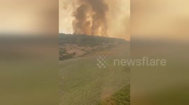 Spain: Wildfire Fury Erupts Over Ourense As Firefighters Battle Blaze From Sky