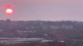 US: Striking Sunrise Painted By Wildfire Smoke Over Cambridge