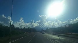 Unusual cloud formation like giant dragon chasing sun amazes locals