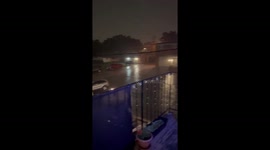Night rain shower with lightning flashes in Milwaukee, Wisconsin