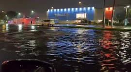 Water bubbles up from manhole cover during floods in Mexico City