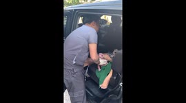 Medics rush to help woman giving birth in a car