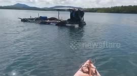 Woman found dead in canal in Thailand weighed down with dumbbells