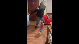 Man and dog dance together in Limache, Chile