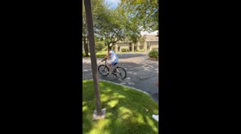 Dad teachers daughter's boyfriend how to ride a bike