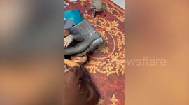 Thai poke tattoo artist tattoos British singer Oliver Sykes