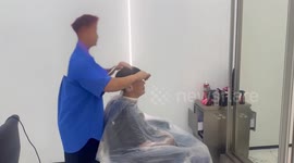 Seven Chinese men arrested for 'working illegally as hairdressers' in Bangkok
