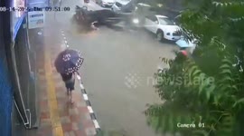 India: Tragedy in Delhi: Tree Crushes Bike, Killing One and Injuring Two During Heavy Rainfall