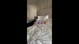 Tickle time turns tot into giggle machine- playful clip captures father-son joy