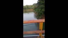 Father, 53, killed by crocodile in front of horrified family as they bathe in river