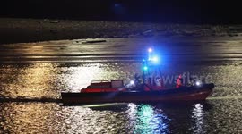Police and RNLI search the Thames after person falls from Uber Boat late at night
