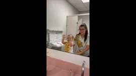 Mom retreats to restroom after baby’s surprise vomit, swears to pack spare clothes for herself too