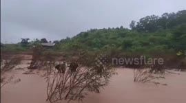 Flash flood submerges villages as heavy rain hits northern Thailand