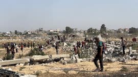 Hunger-stricken Palestinians rush for airdropped aid in Gaza