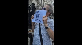 Police nearly arrest man for holding 'I support Palestine in Acton' banner outside Downing Street, misspelling confuses officers