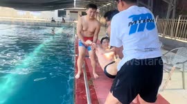 Friend slips into swimming pool during prank in Hebei, China