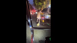 Pet duck hops onto electric motorcycle in Guangxi, China