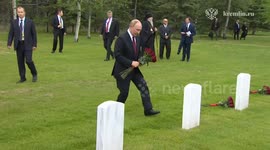 Putin lays flowers at graves of Soviet soldiers in Alaska
