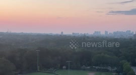 Fiery sunset with wildfire haze over Cambridge, Massachusetts