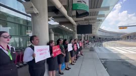 Air Canada flight attendants protest over pay ahead of strike