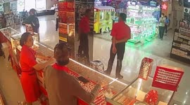Armed robber steals gold jewellery in brazen shopping mall heist