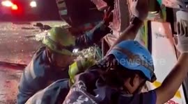 Couple survives after being pinned under overturned 22-wheel truck
