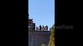 Syria: Israeli-backed Druze removed a banner bearing the name