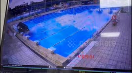 Driver and passengers rescued after car plunges into swimming pool in China