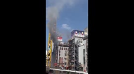 Fire breaks out at building in Osaka's popular shopping district