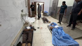 Funeral held for 13 Palestinians killed in Israeli strikes on southern Gaza