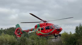 Wales Air Ambulance lifting off from Newtown Powys. (Reg G-LOYW).