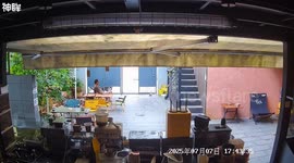 Dog skids and crashes into table and chair while running to owner in Yunnan, China