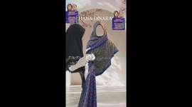 Hijabs appear to be floating as Muslim live steam sellers wear green suits