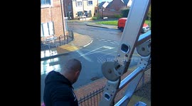 Ladder snaps as man hangs Christmas decorations outside his house