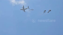 Palestinians rush to airdropped aid amid starvation in Gaza
