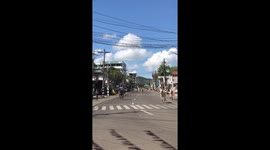 Cowboys scramble to herd cows on road in the Philippines