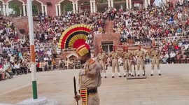 Pakistan: Soldiers of the Pakistan Rangers and the Indian Border Security Force display passion and enthusiasm towards each other during the flag-lowering ceremony