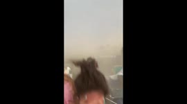 Tourists caught in unexpected “Satan’s Storm” at Playa Granada in Motril, Spain