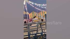 Two people injured as rotating fairground ride collapse in India