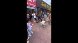 Robot dog queues alongside humans to collect food