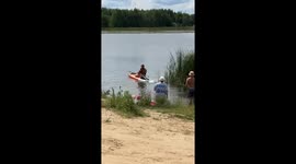 Dicaprio Lookalike Rides Paddle Board