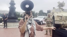 A small group of peaceful protesters demonstrate against the militarization of Washington DC at the Union Station on Wednesday, August 20, 2025.
