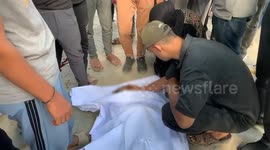 Funeral held for 13 Gaza victims of Israeli strikes