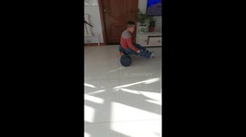 Boy crashes hoverkart into door indoors in Liaoning, China