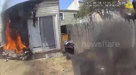 US: NYPD Officers Rescue Family And Dog From House Fire In Coney Island